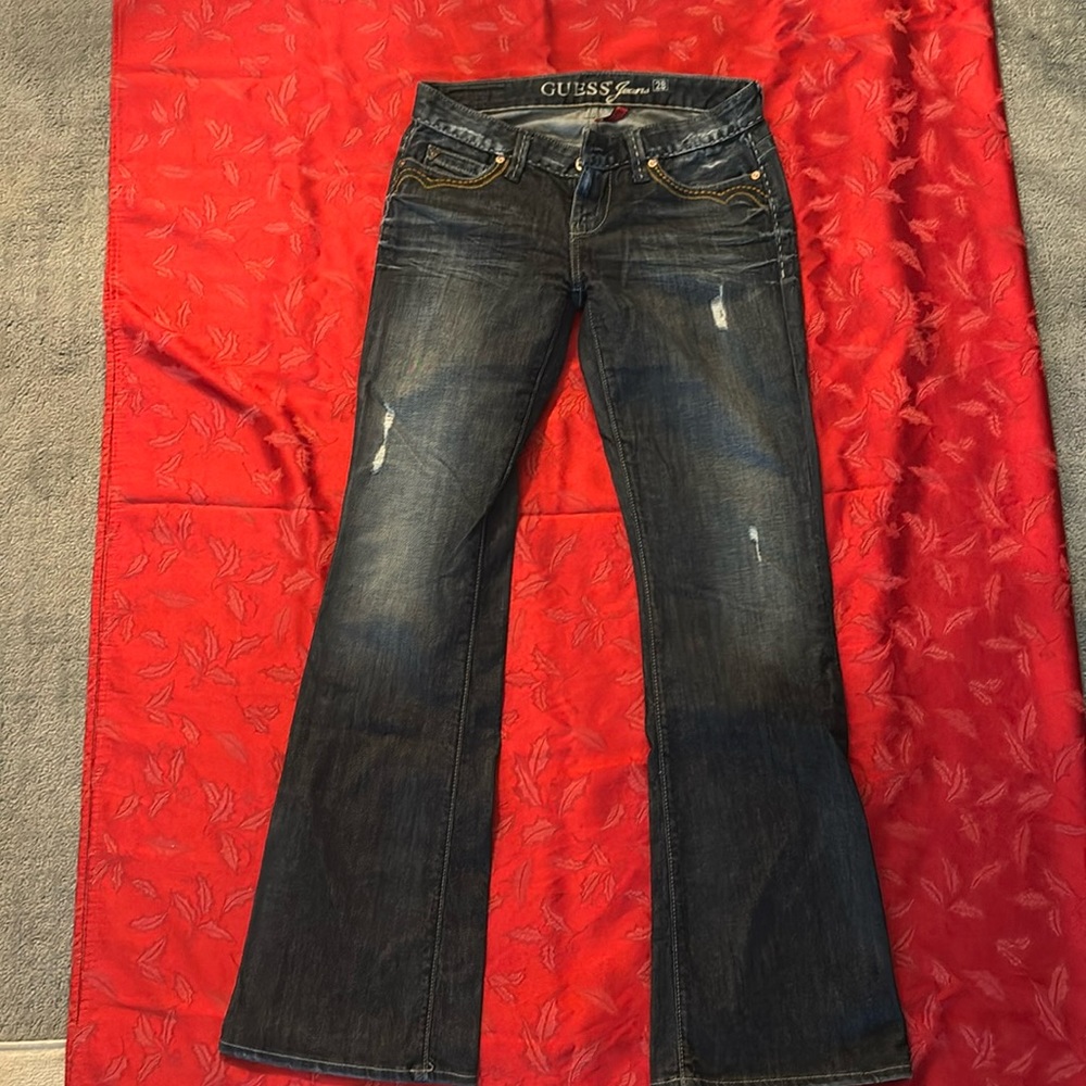 Guess Flare Leg Jeans with Design on Back Pockets. Size 28.